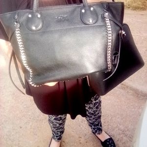 Black and gold Coach bag